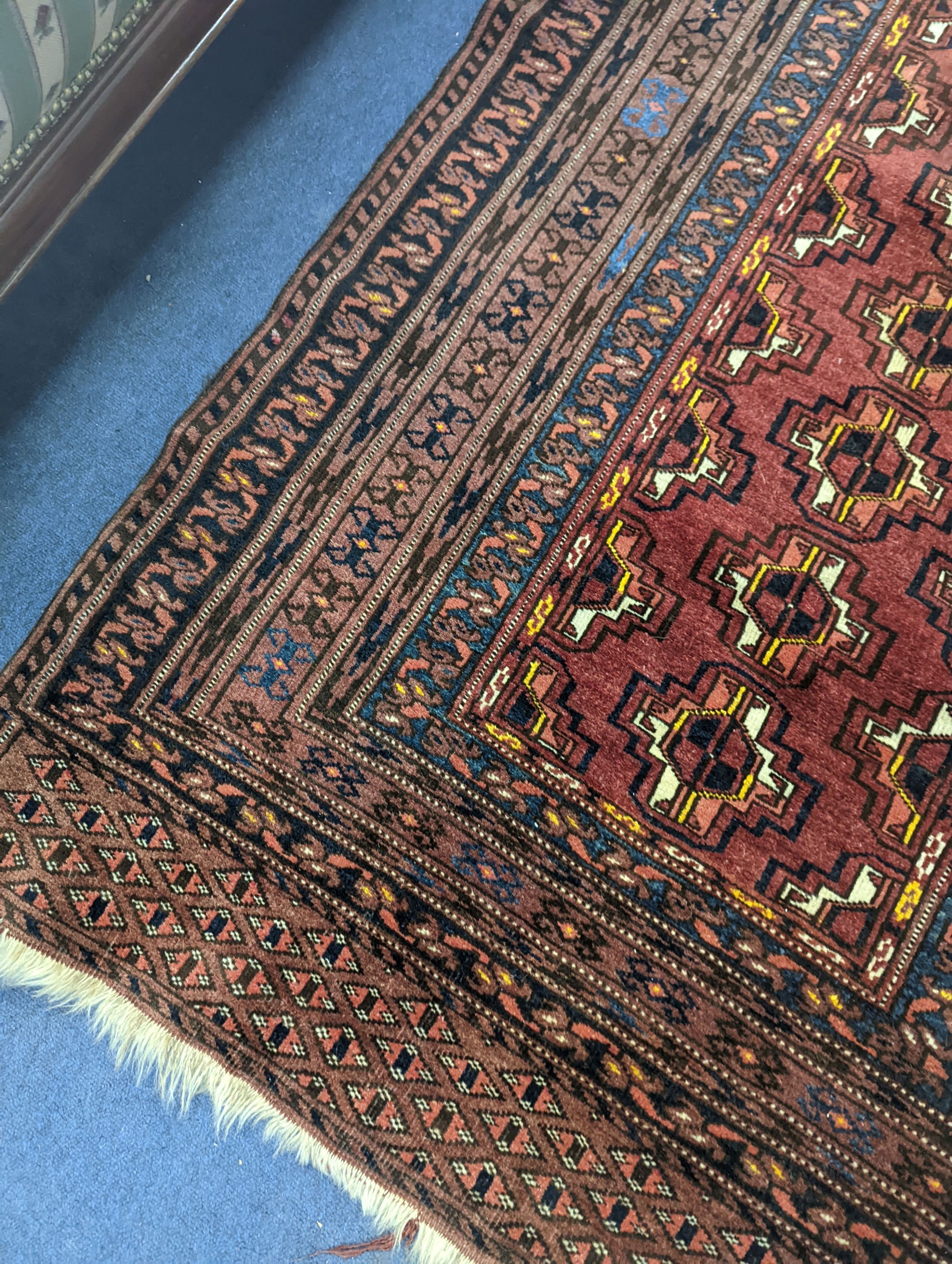 A Bokhara Turkoman geometric rug, 200 x 110cm